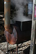 Wood stove used as an outdoor "evaporator" for producing maple syrup, New York State