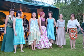 Polish women wearing boho- or hippie-inspired dresses, floral prints and peasant blouses, 2014