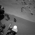 Curiosity's scoop "bite marks" in the sand patch at the Rocknest site (October 15, 2012).