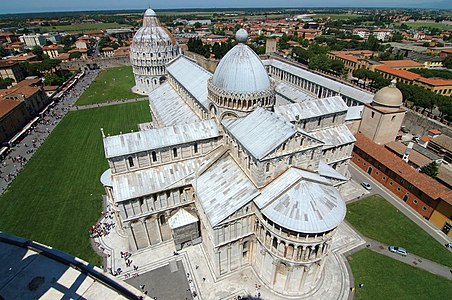 Pisa Cathedral from the "Leaning Tower" shows the Latin Cross form, with projecting apse, foreground and free-standing baptistry at the west.