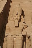Statue at Abu Simbel of Ramesses II wearing the pschent atop a nemes