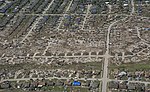 An aerial photograph, from the Oklahoma National Guard, of homes destroyed by the 2013 Moore tornado.[9]