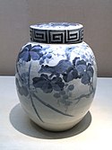 Tobe ware covered jar, grape and squirrel design, blue underglaze. Edo period, 19th century