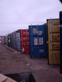 ISO-code and dimension/load table on several newly washed containers
