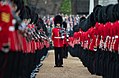 A Coldstream Guards Sergeant dressing through the ranks during the rehearsal for the Trooping the Colour