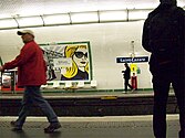 Metro users on Saint-Lazare platform
