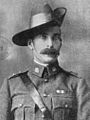 Lieutenant Colonel Harry Chauvel wearing a Sam Brown belt, rising sun badges on his collars, and a slouch hat, turned up on the left side, 1902.