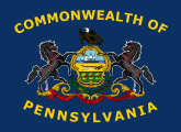 2007–2010 proposal,[11][12] adding the words "Commonwealth Of" to the top and "Pennsylvania" to the bottom of the flag in yellow silk, and arching the lettering around the coat of arms