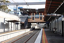 A Northbound View of Glenroy station with a modern concourse and lowered platforms