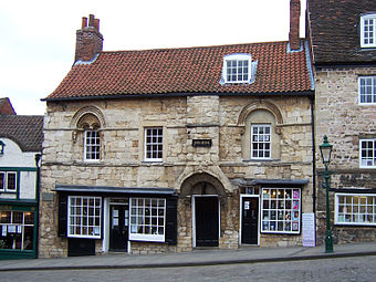 The 12th century Jew's house in Lincoln, England, while carefully conserved and protected, retains all the changes and accretions of later centuries.
