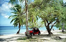 A Mini Moke on the beach at Speightstown, Barbados