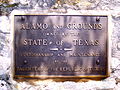 Plaque on a wall at the Alamo, recognizing ownership by the state of Texas and custodianship of the Daughters of the Republic of Texas