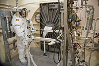 Samantha Cristoforetti attired in an Extravehicular Mobility Unit suit