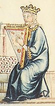 Image of a King playing a triangular psaltery