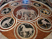 Ruota della Fortuna "The Wheel of Fortune" is the Centerpiece of the mosaic inlaid floor of the Siena Cathedral (c.1372)