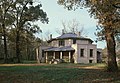 Another example of concrete construction. A variation on the pure octagon plan, with square wings extending on four sides. Zelotes Holmes House, Laurens, South Carolina (built 1859).