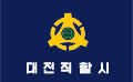 Former flag of Daejeon, South Korea (1972–1995) contains small green sun cross in the centre