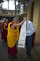 The 14th Dalai Lama giving Ludovic a khata