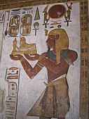 Relief from the Sanctuary of Khonsu Temple depicting Rameses III wearing a nemes