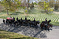 A casket team from the 3rd United States Infantry Regiment "The Old Guard" transports the remains of Retired Chief Warrant Officer Michael J. Novosel during a ceremonial funeral procession at Arlington National Cemetery where he was laid to rest on April 13, 2006.