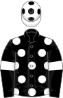 Black, white spots and armlets, white cap, black spots