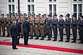 President Barack Obama reviews Polish soldiers alongside soldiers from Illinois