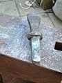 Hardy tool used to cut hot metal alongside the hardy hole