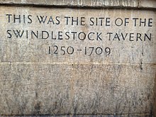 Plaque that reads "This was the site of Swindlestock Tavern 1250–1709"