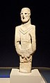 Urfa Man, in the Şanlıurfa Museum; sandstone, 1.80 meters, c. 9,000 BCE