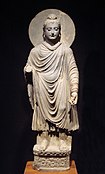 Rosette design at the bottom of a statue of the Buddha, circa 1st century CE. Greco-Buddhist art found in Gandhara