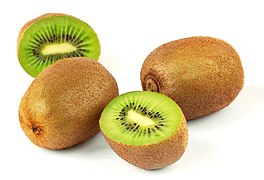 A still life photograph of Kiwifruit against a white background