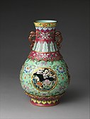 Vase; last quarter 18th century; porcelain with openwork medallions, painted in overglaze famille rose enamels, with engraved design: height: 29.8 cm, diameter: 19.1 cm; Metropolitan Museum of Art
