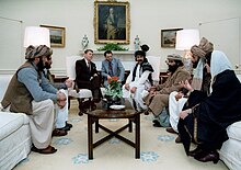 Reagan in the Oval Office, sitting with people from the Afghanistan-Pakistan region, February 1983
