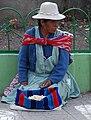 Eine Frau verkauft Bohnen auf der Straße, Potosí