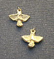 Gold pendants in the shape of owls