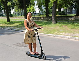 Electric kick scooter in use