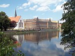 Eine der bekanntesten Ansichten von Grimma: Die Klosterkirche Grimma und das benachbarte Gymnasium St. Augustin (Architekt: Hugo Nauck)
