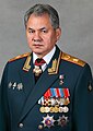 Shoigu in open collar parade uniform (phased out beginning 2018)[9]