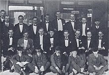 Railway Club at Oxford, conceived by John Sutro, dominated by Harold Acton. Left to right, back: Henry Yorke, Roy Harrod, Henry Weymouth, David Plunket Greene, Harry Stavordale, Brian Howard. Middle row: Michael Rosse, John Sutro, Hugh Lygon, Harold Acton, Bryan Guinness, Patrick Balfour, Mark Ogilvie-Grant, Johnny Drury-Lowe; front: porters.