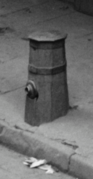 Old style wooden "fire plug" still in use c. 1900