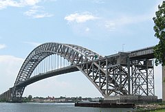 The Bayonne Bridge, a mid-bearing through arch bridge spanning the Kill Van Kull, connecting Bayonne, New Jersey, with Staten Island, New York City