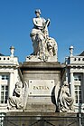 The Monument to the Martyrs of the 1830 Revolution in Brussels, Belgium surmounted by statues for Liberty and Leo Belgicus.