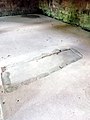 Outline of a tomb in the floor of the chapter house.