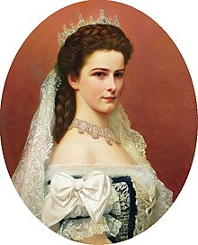 Elisabeth in her coronation Dress Looking Over her Shoulder looking down.