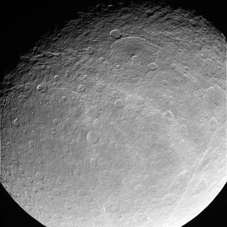 Image of the wispy hemisphere, showing ice cliffs - Powehiwehi (upper center); chasmata stretch from upper left to right center - Onokoro Catenae (lower right).
