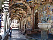 Outer corridor with frescoes