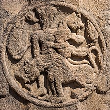 Hero fighting against lions, a motif of West-Asian origin, such as this one or this one.[12]