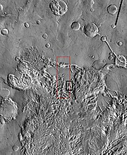 THEMIS image of wide view of following HiRISE images. Black box shows approximate location of HiRISE images. This image is just a part of the vast area known as Aureum Chaos.