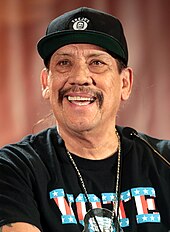 Danny Trejo speaking at the 2017 Phoenix Comicon in Phoenix, Arizona