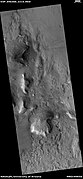 Wide view of fractured ground, as seen by HiRISE under HiWish program. Cracks form on the Martian surface, and then they turn into large fractures.